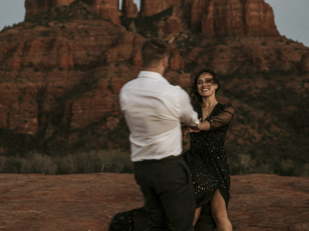 Sarah Hall Photography, Couples Photo's, Colorado Photographer, Sedona Arizona Engagement Photographer, Travel Photographer, Phoenix Arizona Photographer, Adventure Photographer, Cathedral Rock Sedona Arizona, Sedona Photoshoot, Engagement, what to wear for couples pictures, dreamy black star dress dessert photoshoot, red rock, true love, creative couples pictures, candid photos, Grand Junction Photographer, Destination Photographer 