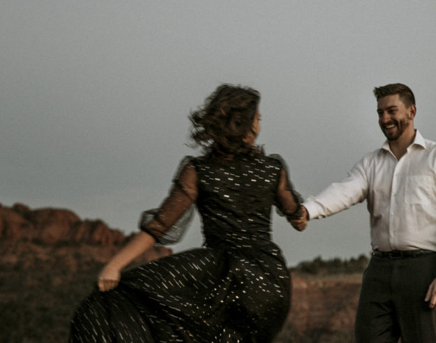 Sarah Hall Photography, Couples Photo's, Colorado Photographer, Sedona Arizona Engagement Photographer, Travel Photographer, Phoenix Arizona Photographer, Adventure Photographer, Cathedral Rock Sedona Arizona, Sedona Photoshoot, Engagement, what to wear for couples pictures, dreamy black star dress dessert photoshoot, red rock, true love, creative couples pictures, candid photos, Grand Junction Photographer, Destination Photographer 