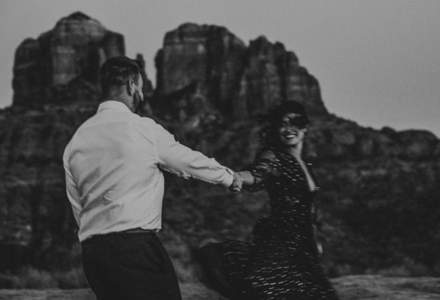 Sarah Hall Photography, Couples Photo's, Colorado Photographer, Sedona Arizona Engagement Photographer, Travel Photographer, Phoenix Arizona Photographer, Adventure Photographer, Cathedral Rock Sedona Arizona, Sedona Photoshoot, Engagement, what to wear for couples pictures, dreamy black star dress dessert photoshoot, red rock, true love, creative couples pictures, candid photos, Grand Junction Photographer, Destination Photographer 