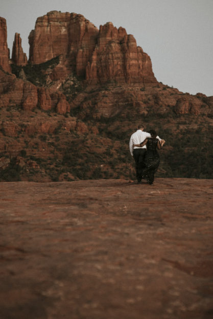 Sarah Hall Photography, Couples Photo's, Colorado Photographer, Sedona Arizona Engagement Photographer, Travel Photographer, Phoenix Arizona Photographer, Adventure Photographer, Cathedral Rock Sedona Arizona, Sedona Photoshoot, Engagement, what to wear for couples pictures, dreamy black star dress dessert photoshoot, red rock, true love, creative couples pictures, candid photos, Grand Junction Photographer, Destination Photographer 