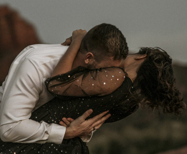 Sarah Hall Photography, Couples Photo's, Colorado Photographer, Sedona Arizona Engagement Photographer, Travel Photographer, Phoenix Arizona Photographer, Adventure Photographer, Cathedral Rock Sedona Arizona, Sedona Photoshoot, Engagement, what to wear for couples pictures, dreamy black star dress dessert photoshoot, red rock, true love, creative couples pictures, candid photos, Grand Junction Photographer, Destination Photographer 