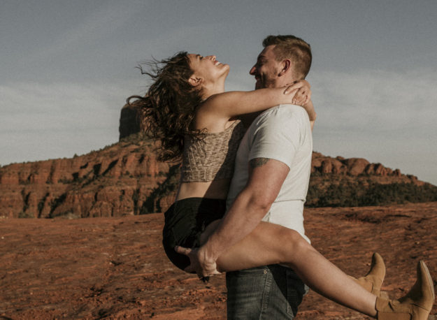 Sarah Hall Photography, Couples Photo's, Colorado Photographer, Sedona Arizona Engagement Photographer, Travel Photographer, Phoenix Arizona Photographer, Adventure Photographer, Cathedral Rock Sedona Arizona, Sedona Photoshoot, Engagement, what to wear for couples pictures, dreamy black star dress dessert photoshoot, red rock, true love, creative couples pictures, candid photos, Grand Junction Photographer, Destination Photographer