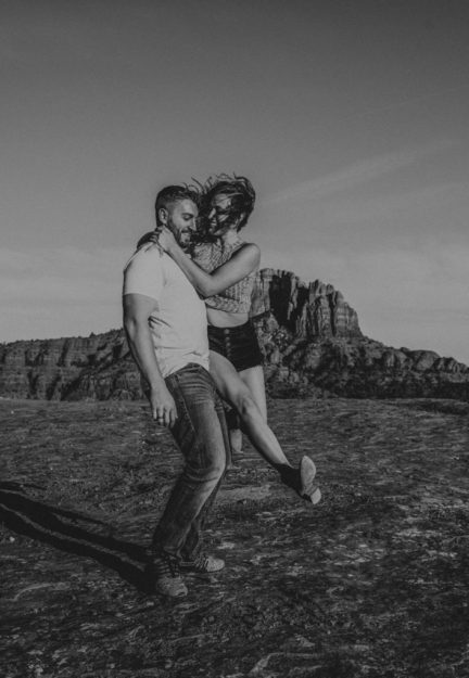 Sarah Hall Photography, Couples Photo's, Colorado Photographer, Sedona Arizona Engagement Photographer, Travel Photographer, Phoenix Arizona Photographer, Adventure Photographer, Cathedral Rock Sedona Arizona, Sedona Photoshoot, Engagement, what to wear for couples pictures, dreamy black star dress dessert photoshoot, red rock, true love, creative couples pictures, candid photos, Grand Junction Photographer, Destination Photographer