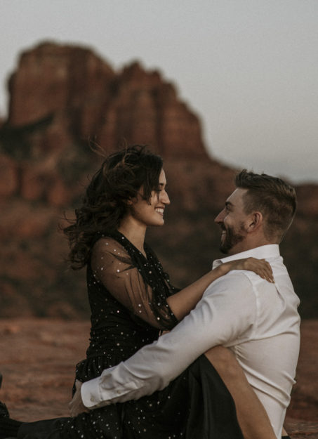 Sarah Hall Photography, Couples Photo's, Colorado Photographer, Sedona Arizona Engagement Photographer, Travel Photographer, Phoenix Arizona Photographer, Adventure Photographer, Cathedral Rock Sedona Arizona, Sedona Photoshoot, Engagement, what to wear for couples pictures, dreamy black star dress dessert photoshoot, red rock, true love, creative couples pictures, candid photos, Grand Junction Photographer, Destination Photographer 