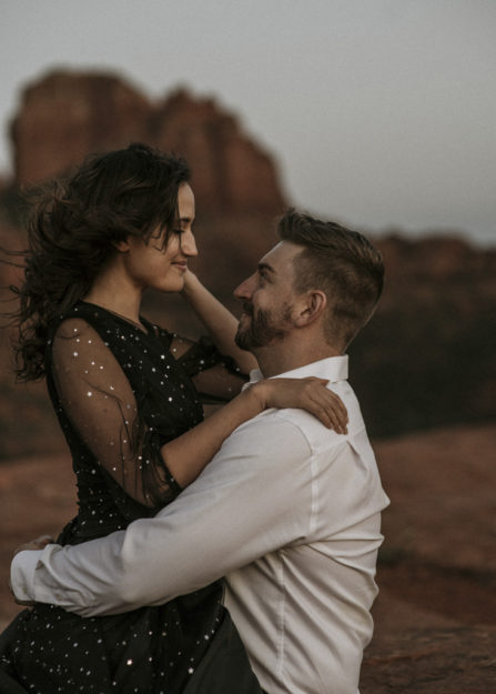 Sarah Hall Photography, Couples Photo's, Colorado Photographer, Sedona Arizona Engagement Photographer, Travel Photographer, Phoenix Arizona Photographer, Adventure Photographer, Cathedral Rock Sedona Arizona, Sedona Photoshoot, Engagement, what to wear for couples pictures, dreamy black star dress dessert photoshoot, red rock, true love, creative couples pictures, candid photos, Grand Junction Photographer, Destination Photographer 